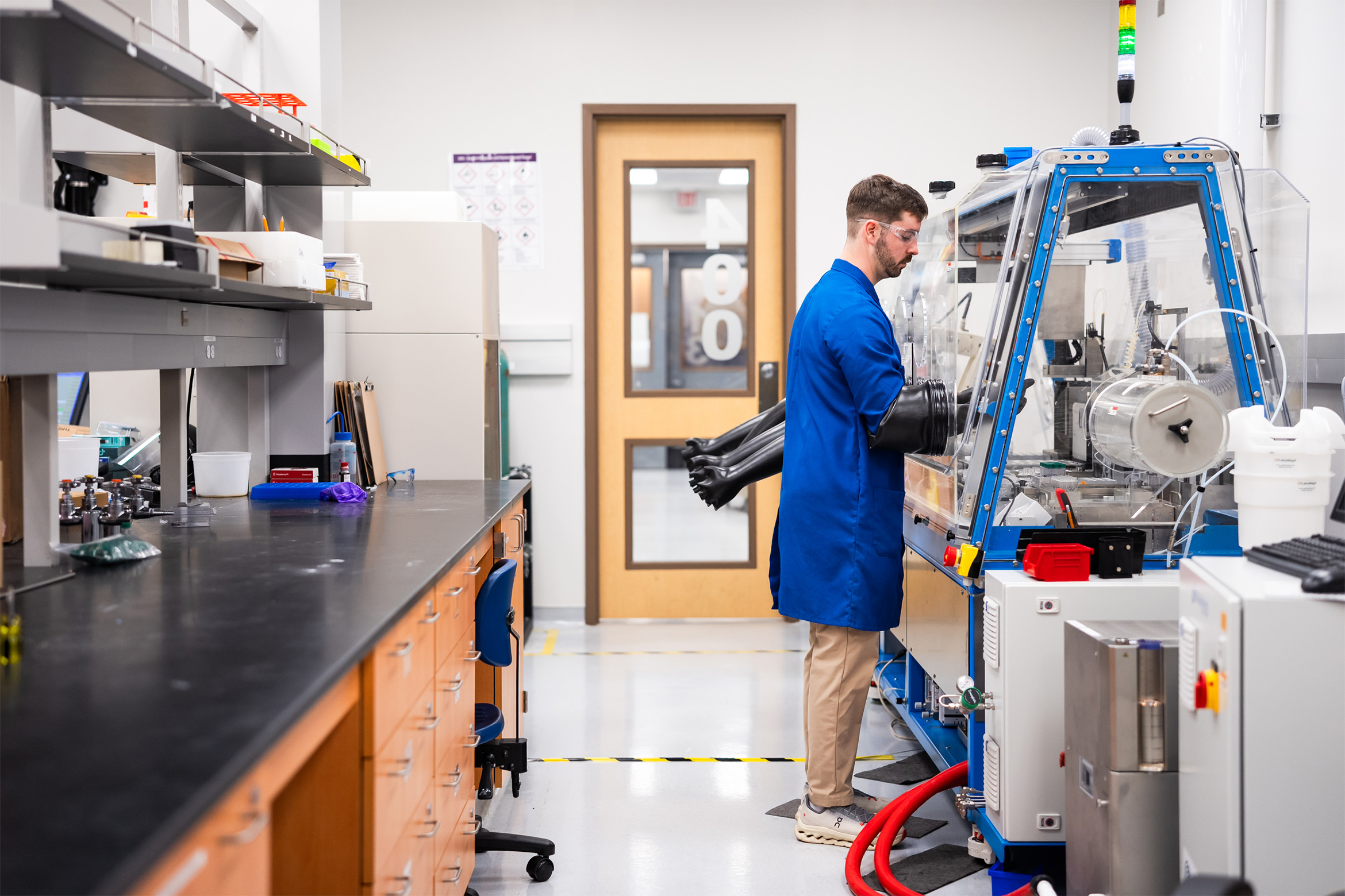A researchers works in one of the many available labs at OASIS.